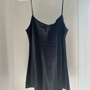 Vince size medium black satin cami with adjustable straps. Never worn.
